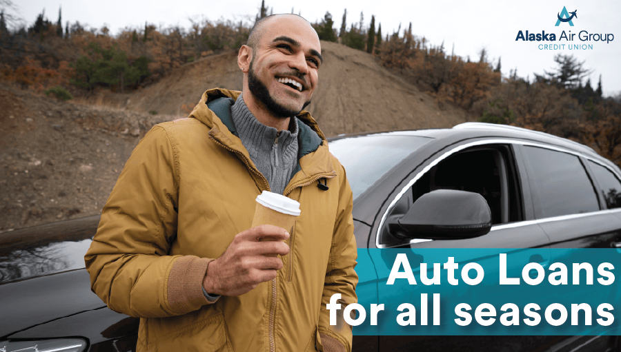 Man looks out the open window of his new car holding up the keys with a thumbs up. Overlaid text reads "The car of your dreams, new, used, or refinanced. Auto loans as low as 4.99% APR* *On approval of credit, restrictions apply."